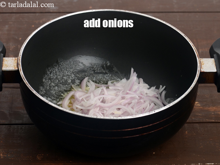 Step 7 – Add&nbsp;3/4 cup&nbsp;thinly&nbsp;<a href="https://tarladalal.com/glossary-sliced-onions-745i">sliced onions</a>.&nbsp;
