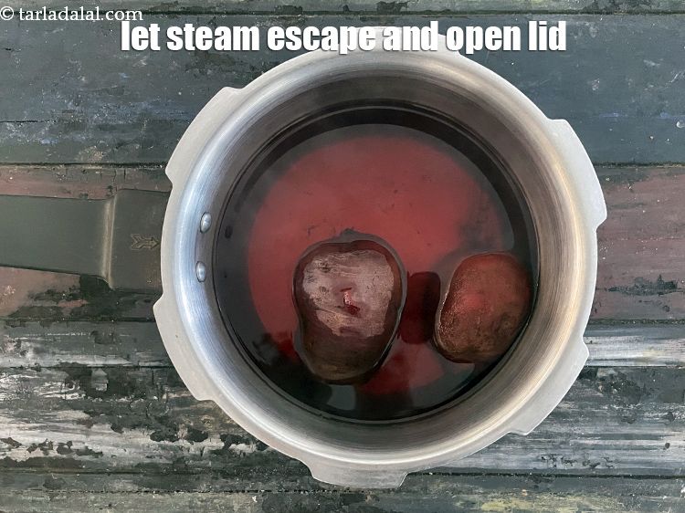 Step 8 – Allow the steam to escape before opening the lid.