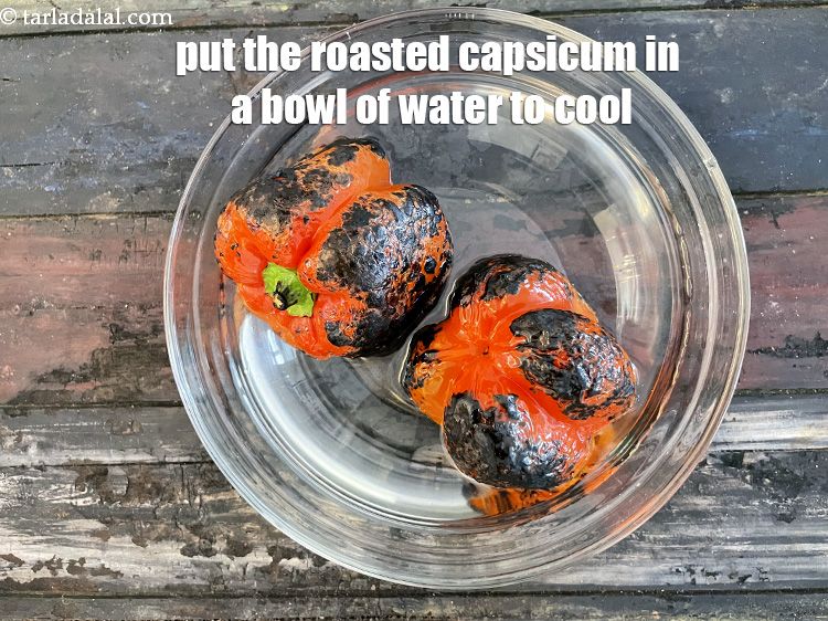 Step 11 – Cool the capsicum and put in a bowl of water.&nbsp;