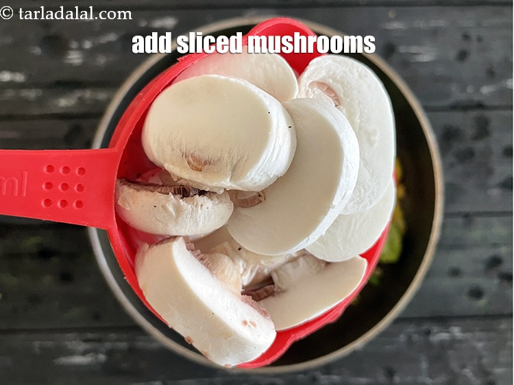 Step 16 – Add&nbsp;<meta charset="UTF-8" />1 cup&nbsp;sliced&nbsp;mushrooms (khumbh).