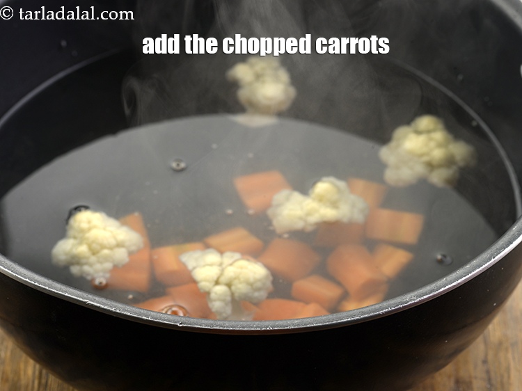 Step 9 – <meta charset="UTF-8" />Now, also add the carrots. You can add any amount of vegetables but, …