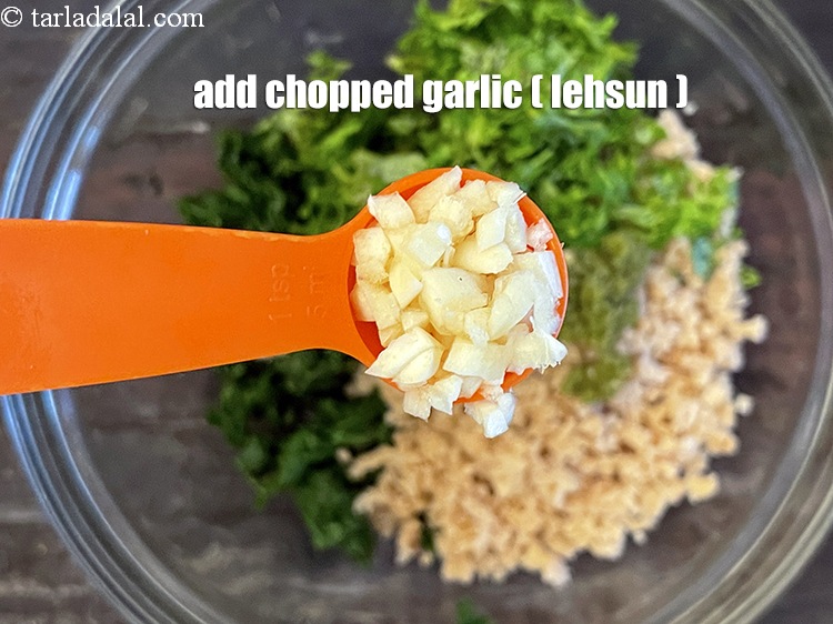 Step 23 – Add&nbsp;<meta charset="UTF-8" />1 tsp&nbsp;finely&nbsp;<a href="glossary-chopped-garlic-790i">chopped garlic (lehsun)</a>.