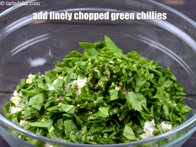 Step 7 – Add 1 1/2 tsp finely&nbsp;<a href="https://www.tarladalal.com/glossary-chopped-green-chilli-820i">chopped green chillies</a>.