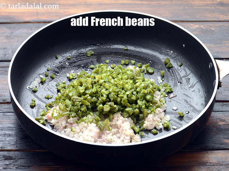 Step 7 – Add 1/2 cup&nbsp;finely&nbsp;<a href="https://www.tarladalal.com/glossary-chopped-and-boiled-french-beans-1079i">chopped and boiled french beans</a>.&nbsp;