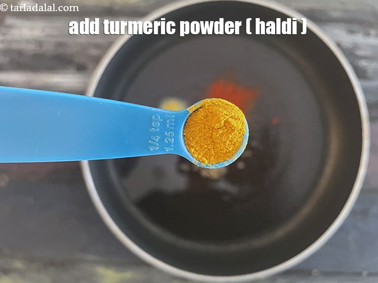 Step 19 – Add&nbsp;<meta charset="UTF-8" />1/4 tsp&nbsp;<a href="glossary-turmeric-powder-haldi-645i">turmeric powder (haldi)</a>.