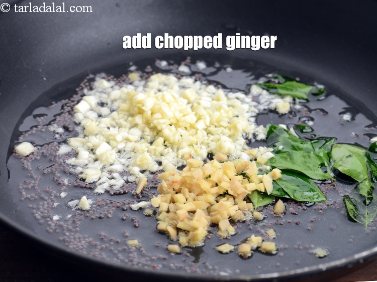 Step 9 – Add 1 tsp finely <a href="https://www.tarladalal.com/glossary-chopped-ginger-786i">chopped ginger (adrak)</a>.