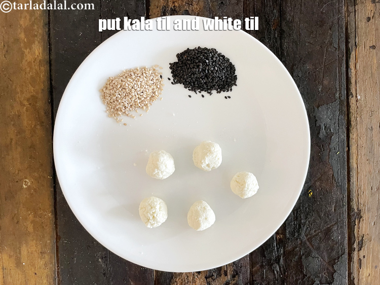 Step 11 – In a plate filled with paneer balls, put&nbsp;<meta charset="UTF-8" />1 tbsp&nbsp;<a href="glossary-black-sesame-seeds-kala-til-kale-til-862i">black sesame seeds (kala …