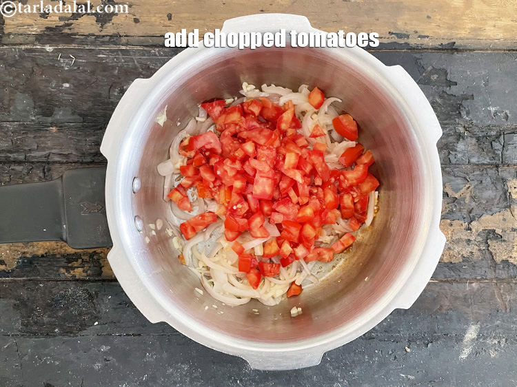 Step 15 – Add&nbsp;<meta charset="UTF-8" />3/4 cup&nbsp;<a href="glossary-chopped-tomatoes-779i">chopped tomatoes</a>.