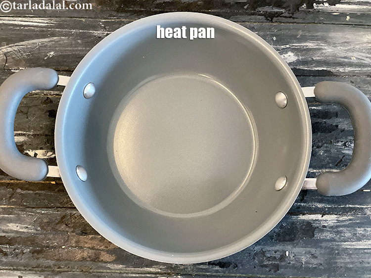 Step 18 – Heat a deep non-stick kadhai.