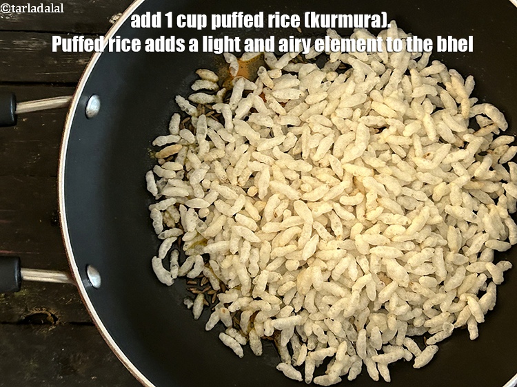 Step 10 – Add&nbsp;<meta charset="UTF-8" />1 cup&nbsp;<a href="glossary-puffed-rice-kurmura-murmura-mamra-537i">puffed rice (kurmura)</a>.&nbsp;Puffed rice adds a light and airy element to …