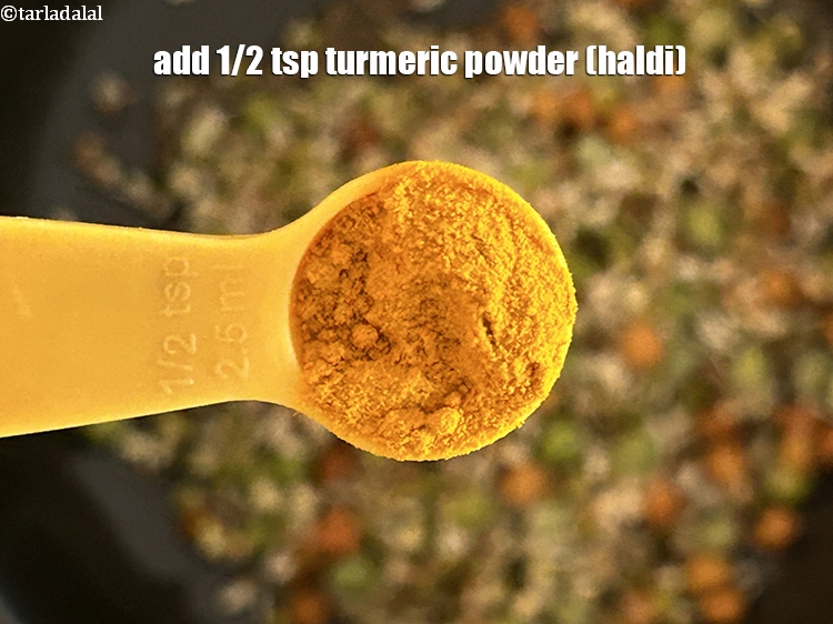 Step 8 – Add&nbsp;<meta charset="UTF-8" />1/2 tsp&nbsp;<a href="glossary-turmeric-powder-haldi-645i">turmeric powder (haldi)</a>.