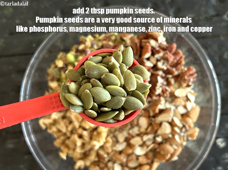 Step 10 – <meta charset="UTF-8" />Add 2 tbsp&nbsp;<a href="glossary-pumpkin-seeds-pepitas-kaddu-ke-beej-857i">pumpkin seeds</a>.&nbsp;<a href="https://www.tarladalal.com/recipes-using-pumpkin-seeds-pepitas-kaddu-ke-beej-857">Pumpkin seeds</a>&nbsp;are a very good source of minerals …
