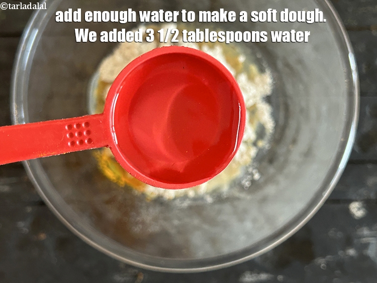 Step 8 – Add enough water to make a soft dough. We added 3 1/2 tablespoons water.
