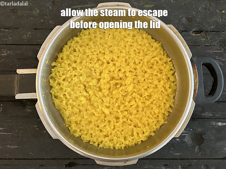Step 15 – Allow the steam to escape before opening the lid.