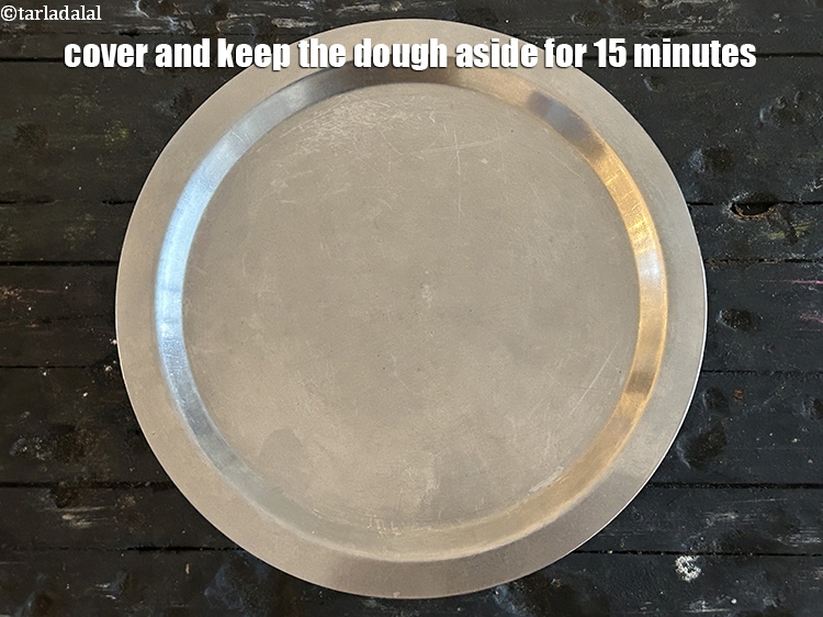 Step 8 – Cover and keep the dough aside for 15 minutes.