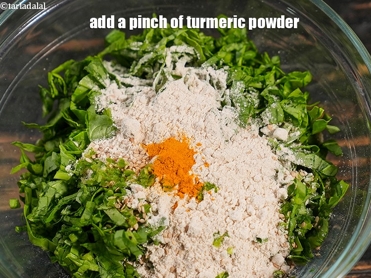 Step 8 – Add a pinch of <a href="https://www.tarladalal.com/glossary-turmeric-powder-haldi-645i">turmeric powder (haldi)</a>.