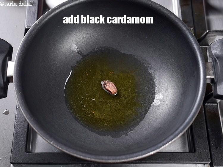 Step 12 – Add 1 black cardamom.