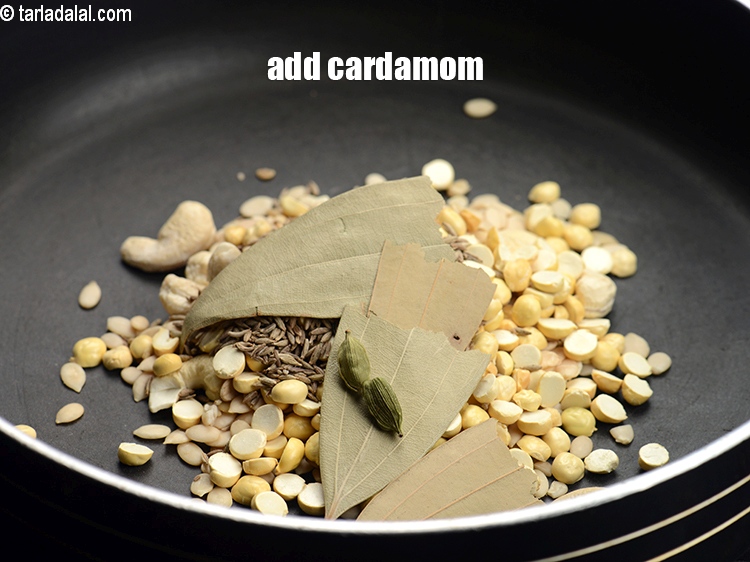 Step 8 – Add 2&nbsp;<a href="https://www.tarladalal.com/glossary-cardamom-elaichi-262i">cardamoms (elaichi)</a>.