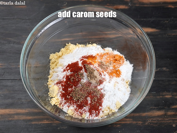 Step 8 – Add 1/4 tsp <a href="https://www.tarladalal.com/glossary-carom-seeds-ajwain-thymol-seeds-bishops-weed-266i">carom seeds (ajwain)</a>.