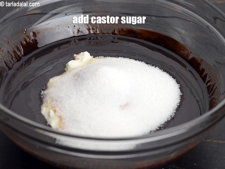 Step 9 – Add &frac14; cup <a href="https://www.tarladalal.com/glossary-castor-sugar-279i">castor sugar</a>.