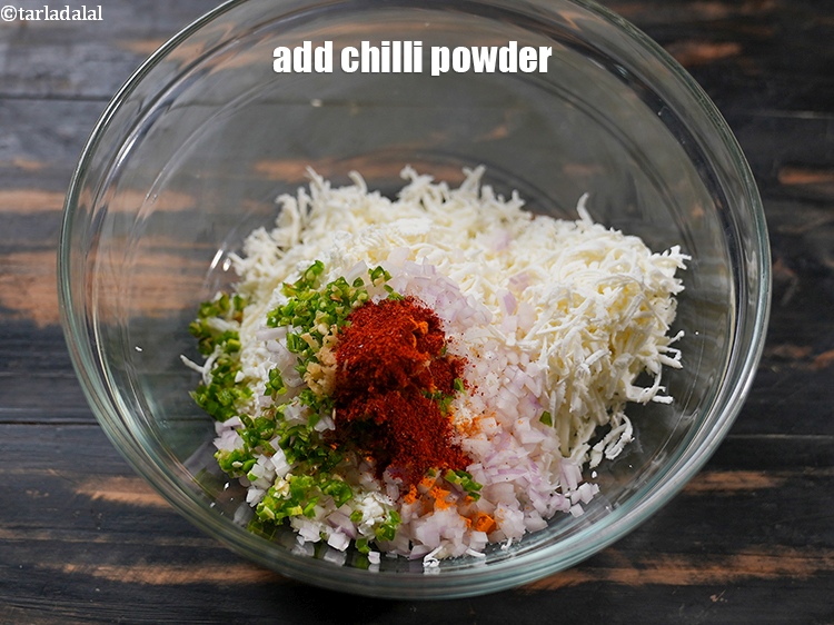 Step 8 – Add &frac12; tsp <a href="https://www.tarladalal.com/glossary-chilli-powder-red-chilli-powder-339i">chilli powder</a>.