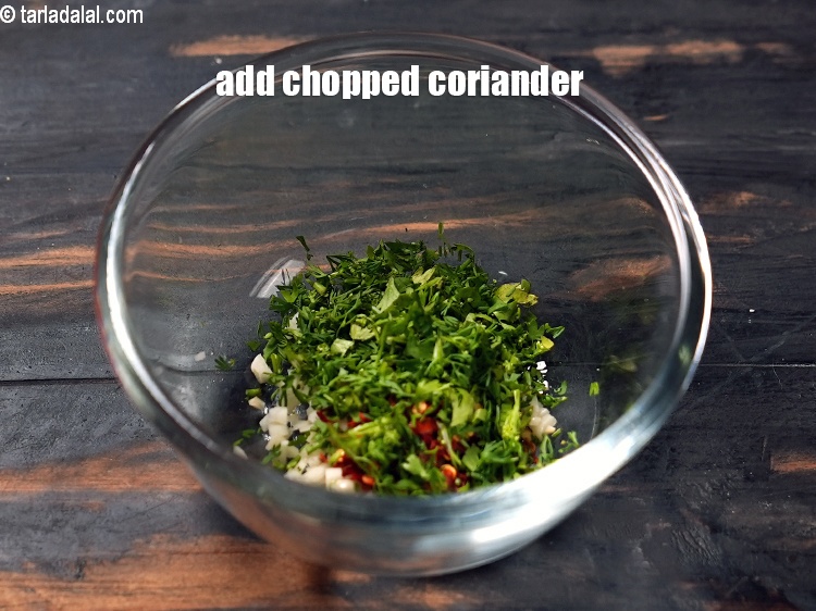 Step 8 – Add 1 tbsp finely&nbsp;<a href="https://www.tarladalal.com/glossary-chopped-coriander-783i">chopped coriander (dhania)</a>.