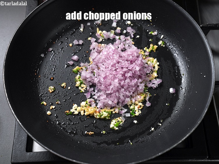 Step 8 – Add 1/2 cup&nbsp;<a href="https://www.tarladalal.com/glossary-chopped-onions-722i">chopped onions</a>.