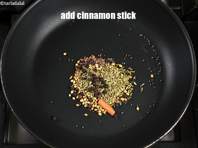 Step 8 – Add &frac12; inch&nbsp;<a href="https://www.tarladalal.com/glossary-cinnamon-dalchini-346i">cinnamon (dalchini)</a>&nbsp;stick.