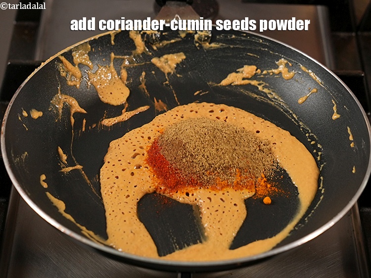 Step 8 – Add 2 tsp <a href="https://www.tarladalal.com/glossary-coriander-cumin-seeds-powder-dhania-jeera-powder-375i">coriander-cumin seeds (dhania-jeera) powder</a>.