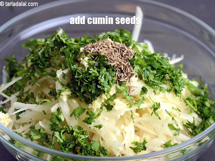 Step 8 – Add &frac12; tsp&nbsp;<a href="https://www.tarladalal.com/glossary-cumin-seeds-jeera-zeera-381i">cumin seeds (jeera)</a>.