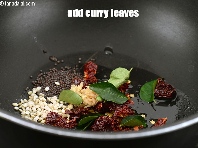 Step 27 – Add&nbsp;4 to 5&nbsp;<a href="https://www.tarladalal.com/glossary-curry-leaves-kadi-patta-kadipatta-388i">curry leaves (kadi patta)</a>.