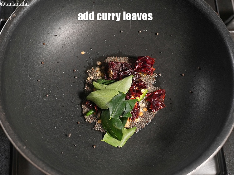 Step 8 – Add 8 to 10 <a href="https://www.tarladalal.com/glossary-curry-leaves-kadi-patta-kadipatta-388i">curry leaves (kadi patta)</a>.&nbsp;