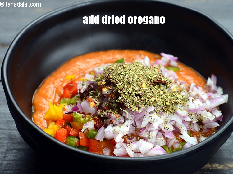 Step 8 – Add 1 tsp&nbsp;<a href="https://www.tarladalal.com/glossary-dried-oregano-268i">dried oregano</a>.