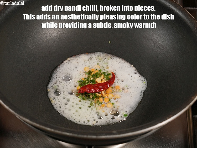 Step 8 – Add 1 dry <a href="https://www.tarladalal.com/glossary-pandi-chillies-pandi-dry-red-chillies-2373i">pandi chilli</a>, broken into pieces. This adds an aesthetically pleasing color …
