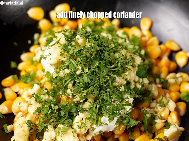 Step 8 – Add 2 tbsp finely <a href="https://www.tarladalal.com/glossary-chopped-coriander-783i">chopped coriander (dhania)</a>.