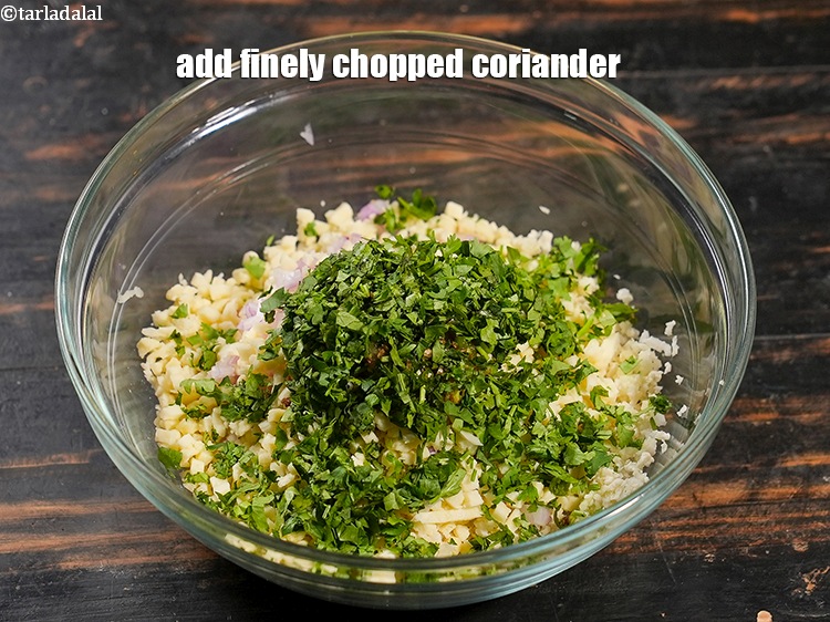 Step 8 – Add 2 tbsp finely <a href="https://www.tarladalal.com/glossary-chopped-coriander-783i">chopped coriander (dhania)</a>.