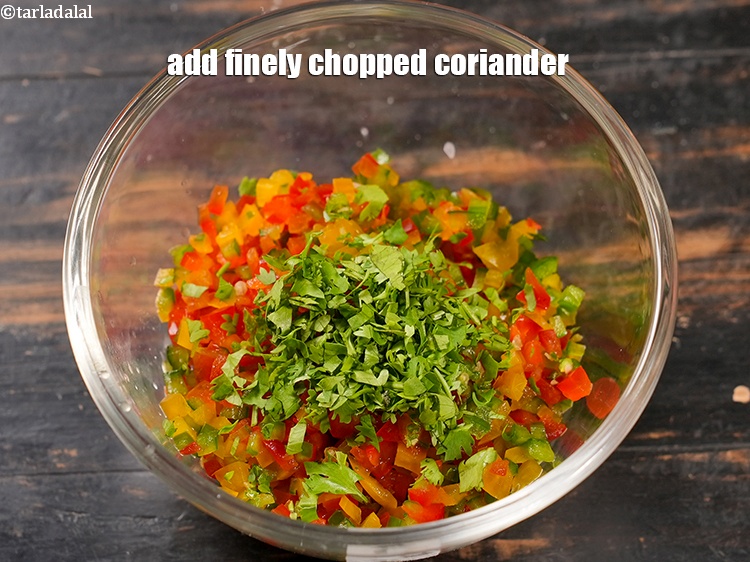 Step 8 – Add 1 tbsp finely <a href="https://www.tarladalal.com/glossary-chopped-coriander-783i">chopped coriander (dhania)</a>.