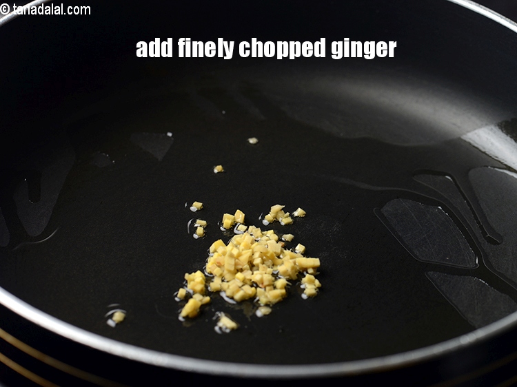 Step 8 – Add &frac12; tsp finely <a href="https://tarladalal.com/glossary-chopped-ginger-786i">chopped ginger (adrak)</a>.