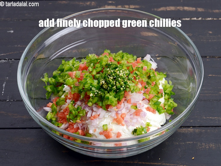 Step 8 – Add 1 tsp finely <a href="https://www.tarladalal.com/glossary-chopped-green-chilli-820i">chopped green chillies</a>.