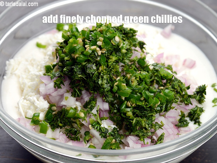 Step 8 – Add 2 tsp finely <a href="https://www.tarladalal.com/glossary-chopped-green-chilli-820i">chopped green chillies</a>.&nbsp;