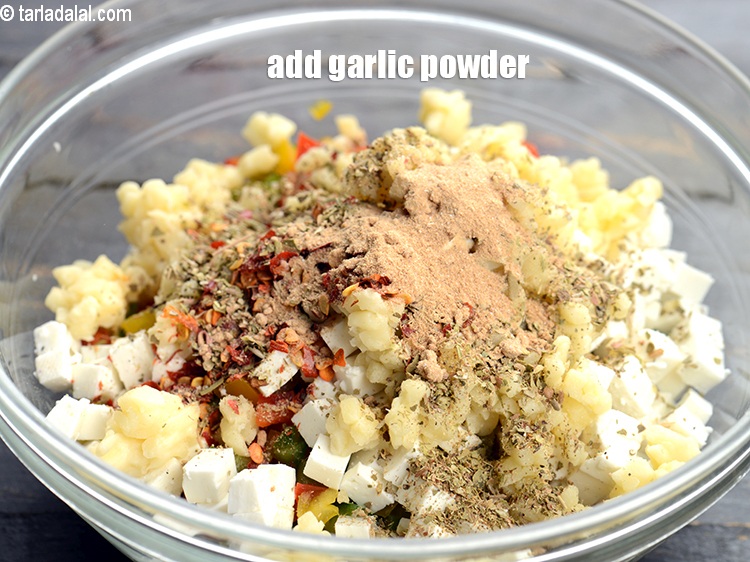 Step 8 – Add &frac12; tsp <a href="https://www.tarladalal.com/glossary-garlic-powder-lehsun-ka-powder-lahsun-ka-powder-351i">garlic (lehsun) powder</a>.