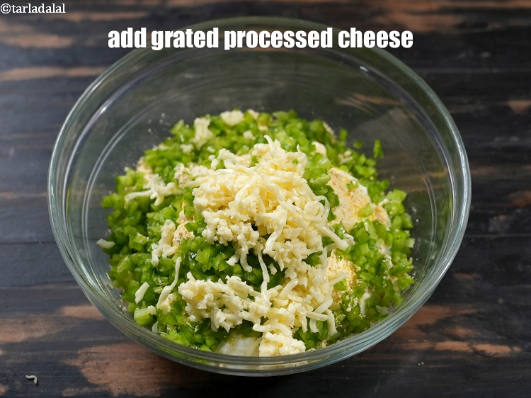 Step 8 – Add 1/4 cup <a href="https://www.tarladalal.com/glossary-grated-processed-cheese-868i">grated processed cheese</a>.