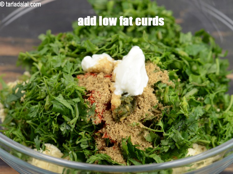 Step 8 – Add 1 tsp <a href="https://www.tarladalal.com/glossary-low-fat-curds-low-cal-dahi-low-calorie-curd-low-fat-yogurt-1107i">low fat curds (dahi)</a>.