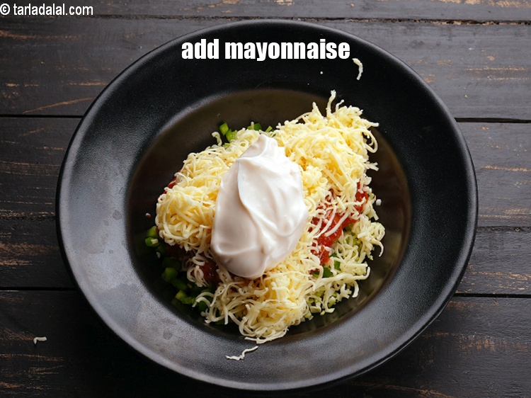 Step 8 – Add 5 tbsp&nbsp;<a href="https://www.tarladalal.com/glossary-mayonnaise-505i">mayonnaise</a>.&nbsp;