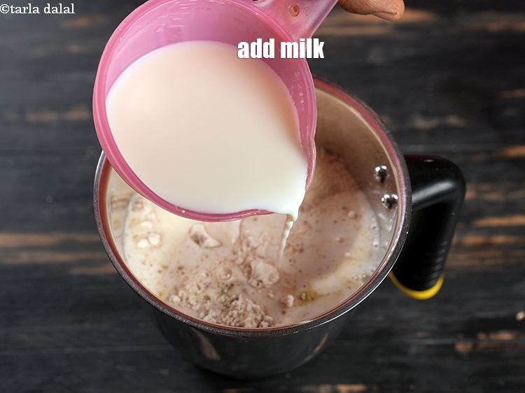 Step 20 – Add 1&frac12; cups milk.