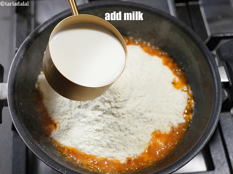 Step 8 – Add 1&frac12; cups of milk.
