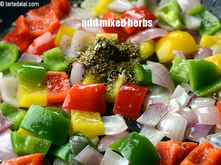 Step 9 – Add 1 tsp mixed herbs.&nbsp;