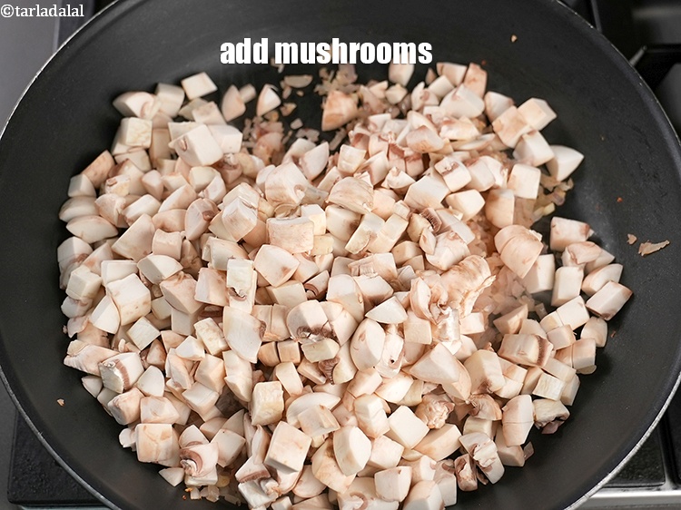 Step 10 – Add 3 cups <a href="https://www.tarladalal.com/glossary-chopped-mushrooms-789i">chopped mushrooms (khumbh)</a>.