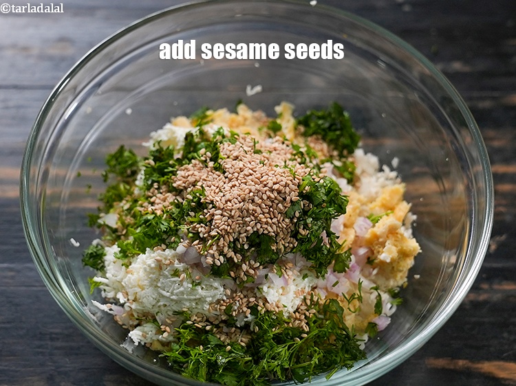 Step 8 – Add 1 tbsp <a href="https://www.tarladalal.com/glossary-sesame-seeds-til-gingelly-seeds-612i">sesame seeds (til)</a>.