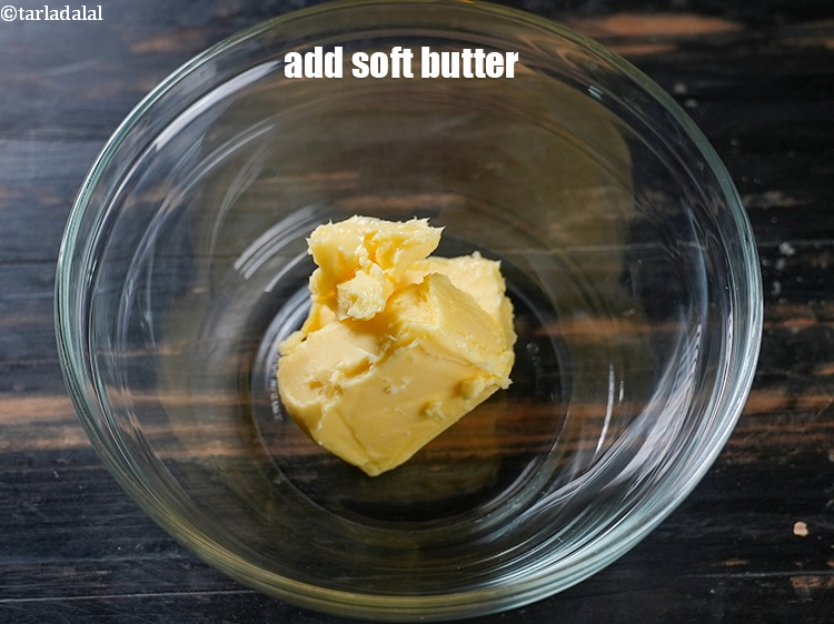 Step 8 – In another bowl, add &frac34; cup <a href="https://www.tarladalal.com/glossary-butter-makhan-233i">butter</a>.
